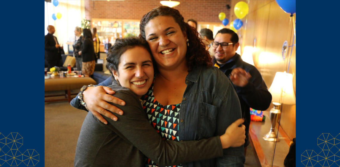 UC Berkeley student parent with counselor at an event